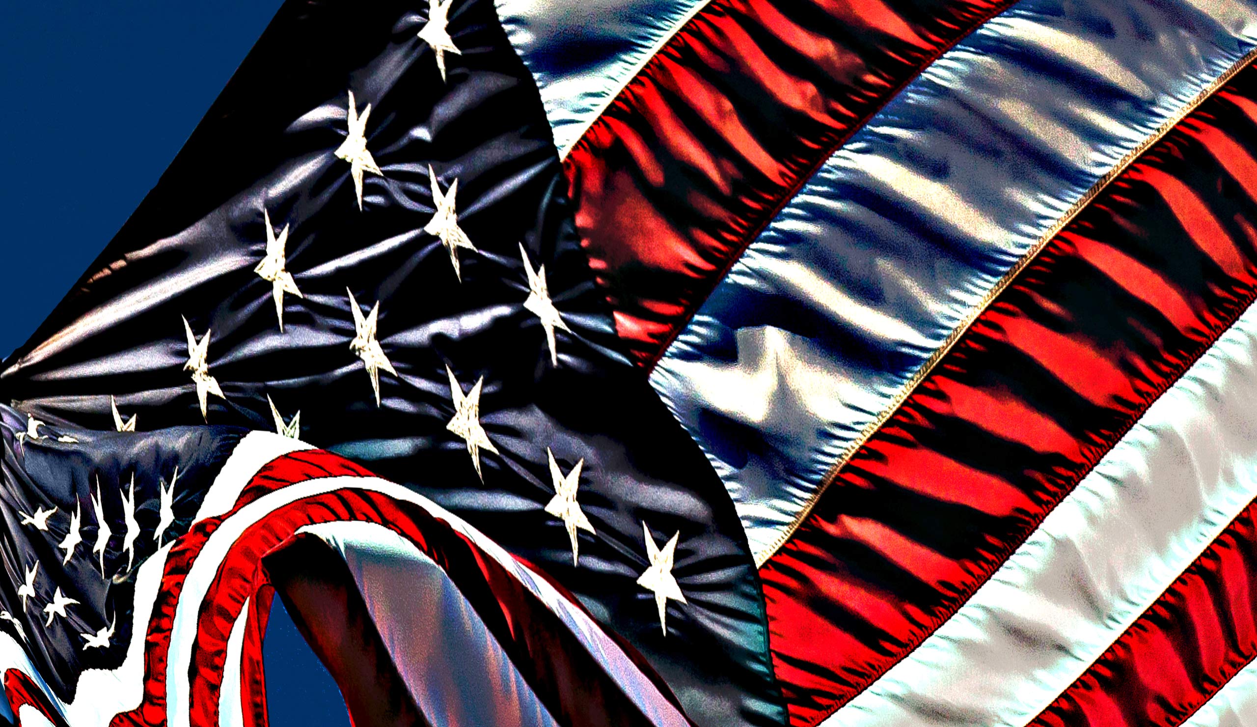 American flag flying over the 911 First Responders Memorial